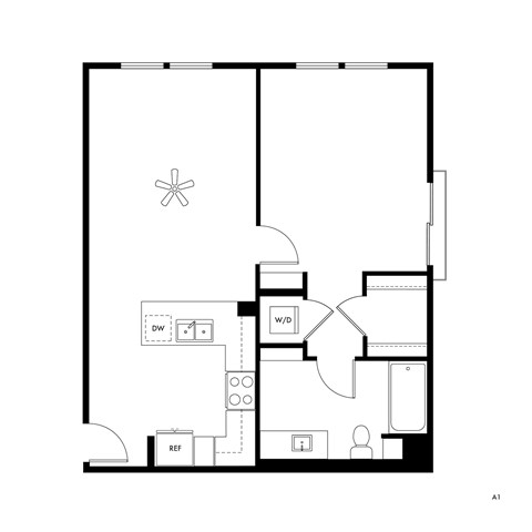 A floor plan of a room with a bathroom, a kitchen, and a living area.